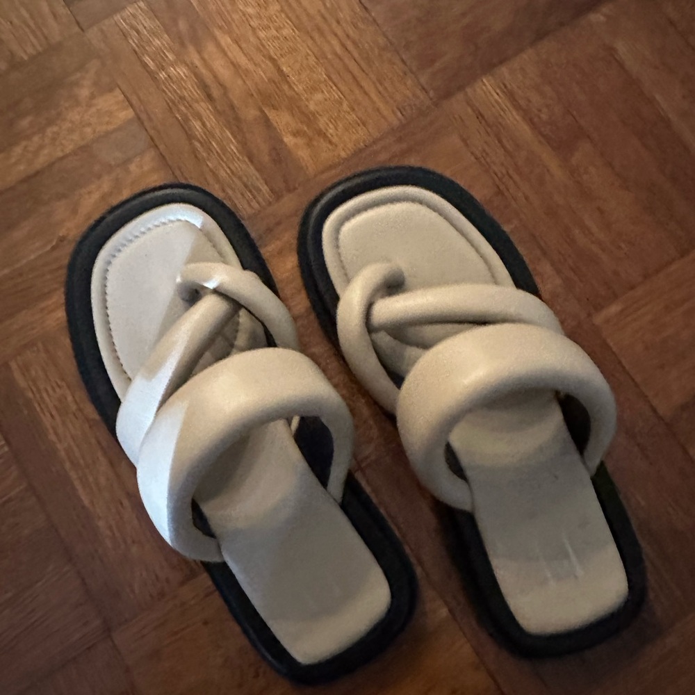Stylish Cream Sandals with Black Soles